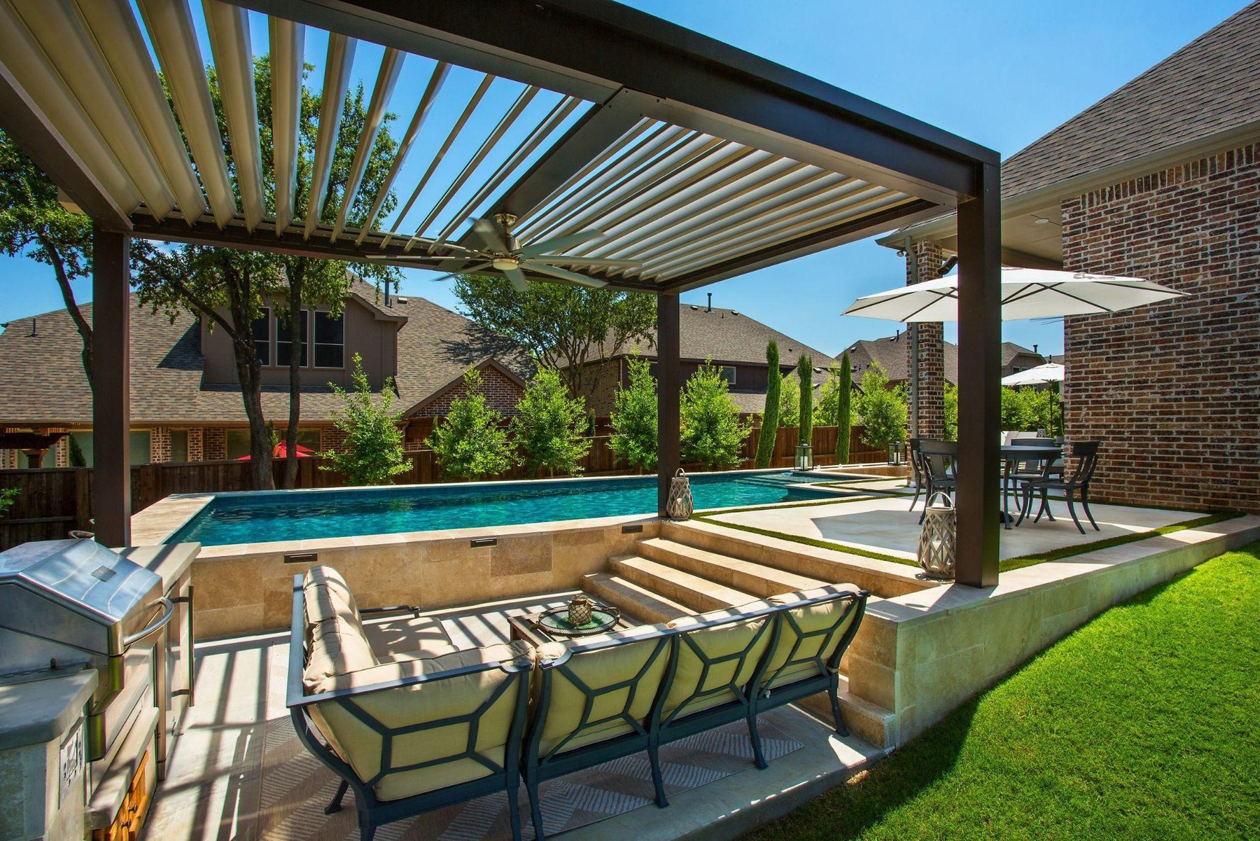 Equinox motorized louvered roof over a residential patio