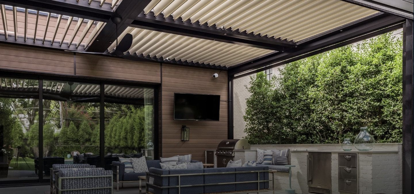 Residential patio shaded by an Equinox louvered roof